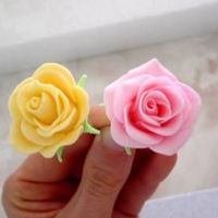 Pink & Yellow Fondant Roses These were a couple of my first successful attempts at Fondant Roses (I did one UGLY GP Rose a while back...lol). The pink rose is made out...
