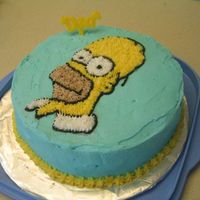 Happy Homer Day This was my first cake that I made at lesson 2 of Level 1 Wilton's class.I definitely need to work on the main icing, getting it...