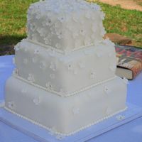 Delicate Flowing Flowers 3 Tier, Square, white on white, silver dragees, cake covered in fondant, gumpaste flowers