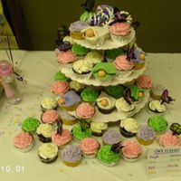 Babies And Butterfies Each color was a diff flavor cake. The babies and blankets are fondant and the butterflies are cupcake picks.