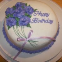 Purple Rose Bouquet A purple rose birthday bouquet cake!