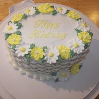 Yellow Flowers And Daisy Basket Yellow themed birthday cake with basket weave