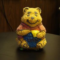Winnie The Pooh This Pooh sat on top of a sheetcake that was half eaten before I could take the pic!