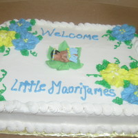 Hawiian Luau Baby Shower Cake this is a strawberry cake with buttercream icing. the baby is made from a first impression mold using gumpaste. with gumpaste skirt and...