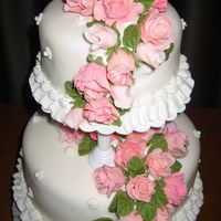 Roses & Cake Wilton Class 3 cake. I have so enjoyed learning how to decorate cakes. I always wondered "how'd they do that?"