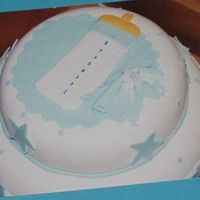 Boy Baby Shower yellow cake with dulce leche filling to resemble the invitation. fondant covered with all details made out of fondant.
