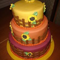 Days In The Country!!! Oh how I love my days in the county!! Three tiers, 2 spice cake, 1 carrot cake, cream cheese filling, fondant icing on tiers, buttercream...