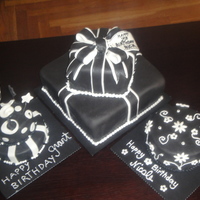 Cake Trio present cake is red velvet with Cream Cheese IMBC, Floral cake is orange blossom with orange IMBC, Small tiered is vanilla with IMBC. These...
