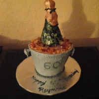 Champagne Bottle In Ice Bucket Thanks to everyone for their photos! This was my first attempt at this. The client really liked it! It is all cake with IMBC