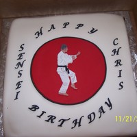 Karate Cake White cake with white marshmallow fondant.