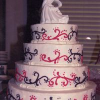 Wedding Cake This picture does it no justice, but this was my first attempt at a wedding cake.