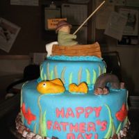 Gone Fishing White cake with vanilla pudding. MMF covering with MMF figures. It was my first attempt at MMF figures.