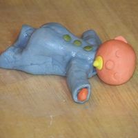 First Baby... I finally got up the nerve to make a baby....his right arm and hinny look a bit "off" to me but am hoping I can drape the blanket...