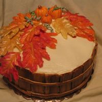 Fall Pumpkin Spice cake / Cream cheese icing. Recipe from Cake Central recipes. The leaves are white chocolate painted with Pearl dust.