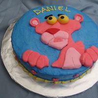 Pink Panther The cake is covered in buttercream and Pink Panther is made from fondant.