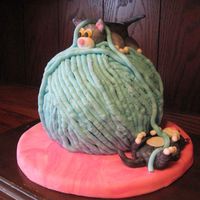 Kittens And Ball Of Yarn This cake is supposed to be made in all fondant but because the people I was making it for didn't like it I made it with BC. I think...