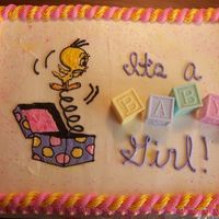 Looney Tunes Baby Shower Cake my first FBCT.. tweetys entire head peeled off with the wax paper but I was happy with the way it turned out...