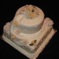 Wilton Course 3 Grand Finale Cake This was my final cake for the Wilton Course 3. It is covered in fondant, with buttercream borders, and gum paste roses, rose buds, and...