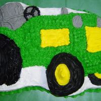 Tractor Cake 1st Tractor cake that I have done. Was sick with the flu all week so wasn't able to give this cake 110% but I did my best.