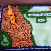 Construction Birthday Cake Boy's 1st Birthday Party. The dirt road is made of graham crackers.