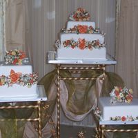 Trialo Elegant Wedding Cake An innovating way to present a wedding cake. The bride came with this idea and I loved it. 14" , 12", two 10" and two 8&quot...