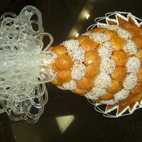 Croquenbouche traditional croquenbouche with a sugar fountain on top