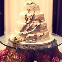 Metallic Tree Wedding Cake Thjis cake was made for a dear friend I worked with many years ago. She has very unique taste and had to have a unique cake. She chose Red...