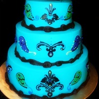 Peacock Bridal Shower Cake This was made for a Bride who Loves Peacock Feathers. This was the first cake I made with my Cake Cricut. I learned alot making this one....