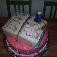 Books And More Books A wedding cake i made for my friend. On one side of the page there is a picture of my birds since my friend loves birds and on the other...