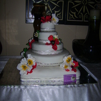 5 Layer Cake a wedding cake with sugar paste flowers and almost everything was edible.