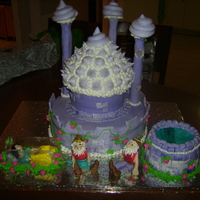 Fairy Tale Of Snow White a birthday cake for my daughter, everything's edible except the toothpicks in the gnomes and poles. it's snow white and 2 of her...