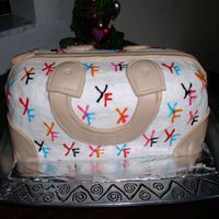 Purse Handbag My First One!!! So Much Fun! I loved doing this cake! It was so much fun...It was for my mother in law. I used her initials. Thanks so much for the tutorial on this...