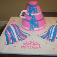 Cheerleader Birthday megaphone consists of 3 tiers stacked and doweled covered in fondant (a nightmare; should have done that differently). Pom poms are half...