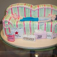 Bridal Shower -- All Shopped Out Bride is an avid shopper! Couch cake covered in MMF with painted accents. Girl (not the best effort, but my first person) and shopping bags...
