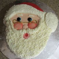 Santa Claus I made this cake for my daughter's ballet class Christmas party. Santa's face, is fondant and his beard and the white of his hat...