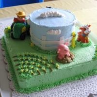 Farm Birthday BC with fondant fence. I used little people farm animals to save time in decorating. Thanks to similar cakes here on CC for inspiration.