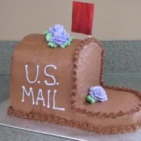 Mailbox Cake This cake was made for my mother-in-laws retirement from the Post Office. My first time making chocolate BC icing. Made 8" rounds and...