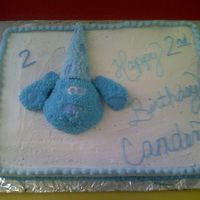 Blues Clues This is another sheet cake with a hald round cake for the character. Blue's head and ears were shaped from the round cake; her hat was...