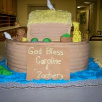 Noah's Ark I made this Noah's Ark cake for my daughter's Baptism. It was lots of fun! Carved cake,covered with MMF. Partially molded animals...