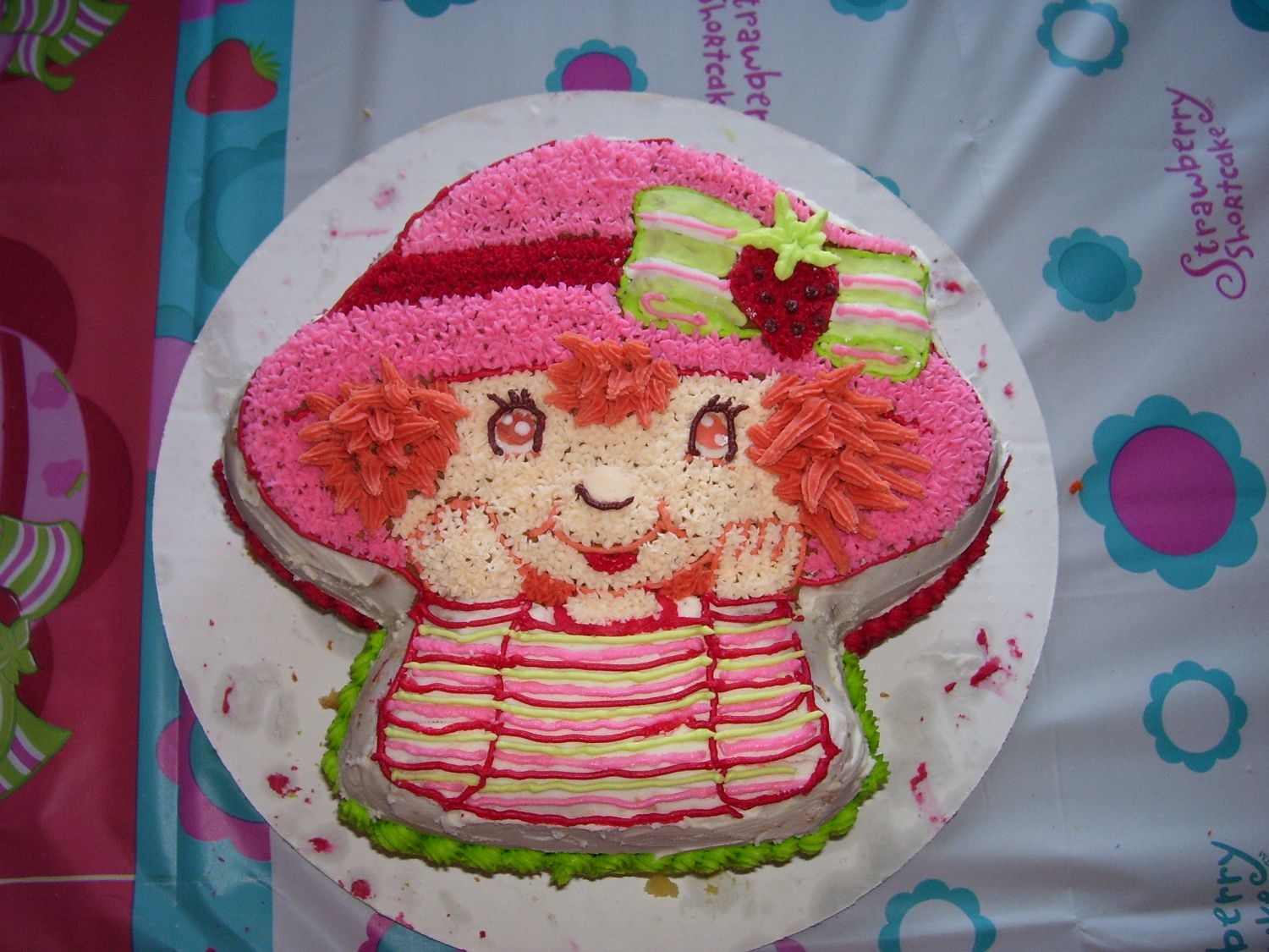 Strawberry Shortcake My girlfriend and I made this for her daughter's 2nd B-day. Lots of fun to make together! Yellow cake with buttercreme icing (2 layers...