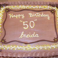 Eneida's Birthday Cake Called this Almond joy cake... chocolate and coconut cake with ganache and almonds in the middle.