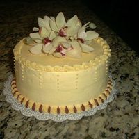 Round Birthday Cake Bc Icing, Silk Flowers I wanted to make a special cake for my Mother's Birthday. This is a spice cake with BC icing and some silk flowers. Happy Birthday Mom...