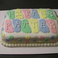 Pitter Patter I made this for my best friend's first baby shower. It is done entirely in homemade marshmallow fondant. I used a cookie cutter to...