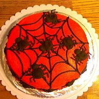 Spider Cake This is a 9" round devil's food 2-layer cake with Snickers Bar Frosting. The icing is buttercream made from scratch tinted with...