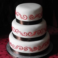 Red Scrolls MMF with brown ribbon and red scrolls. This was fro an engagement party.