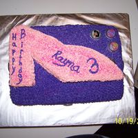 High Heeled Shoe This was a cake I did for a three year olds birthday. I carved the shoe out of a 13X9 sheet cake. Yellow cake with BC frosting on both....