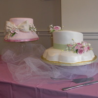 Hat's Off To The Jlw Hat cakes for a JLW tea honoring their annual fund donors. Vanilla and chocolate layers covered with Satin Ice fondant. Gumpaste bow.