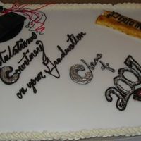 Graduation Hat Cake W/ Choc. Dipped Strawberries Basic yellow half sheet w/ bc. Pic makes the diploma look like a rawhide chew - but it looked very nice on the cake :). Choc. dipped...