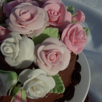 Wilton Course 3 First tiered cake, first fondant roses. Family requested an edible cake, so this is the "Hot Chocolate" cake from the December...