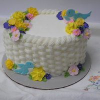 Wilton Course 2 Finale Cake My execution of the last cake for Wilton Course 2. Basketweave. Colorflow Birds. Royal Icing Flowers.
